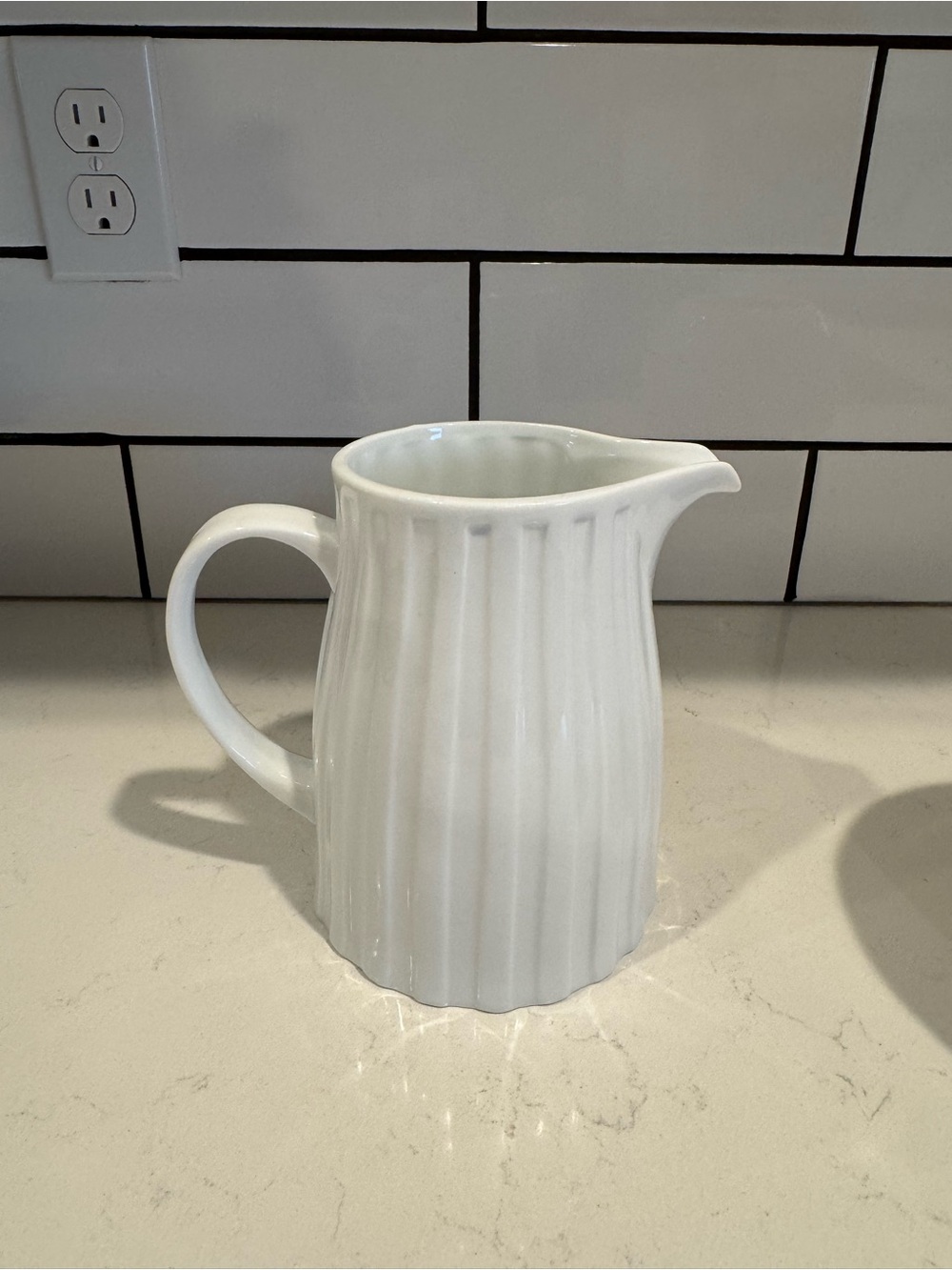 Crate&Barrel White Scalloped Ceramic pitcher